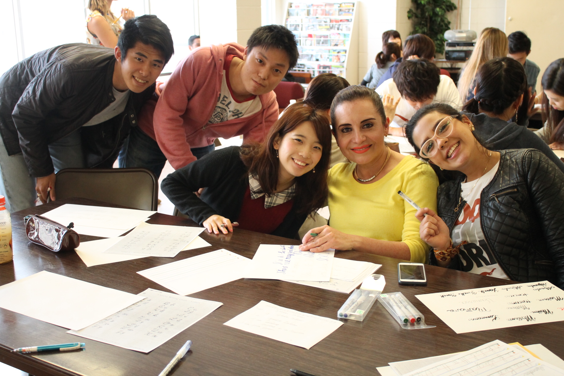 Texas International Education Consortium (白菜网所有网站) students having fun working on a class project