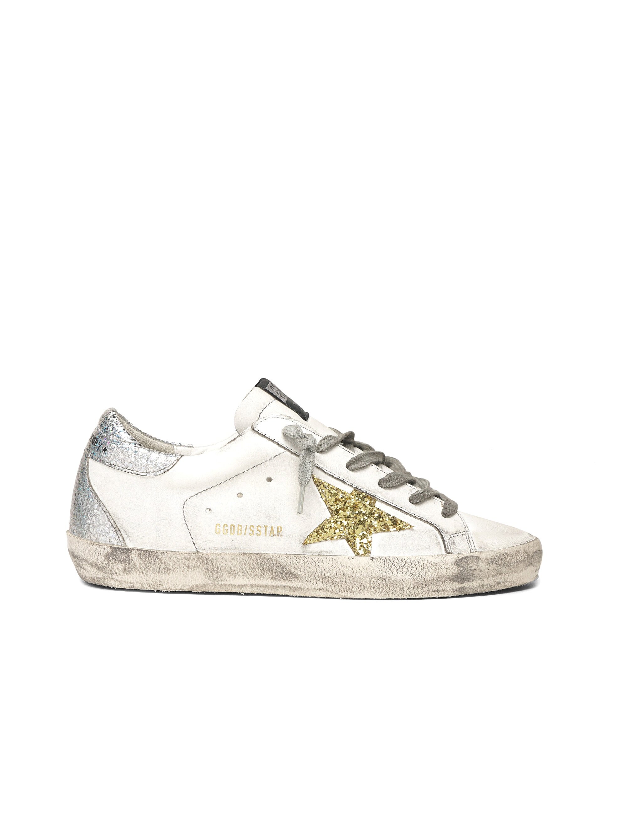 silver and gold golden goose