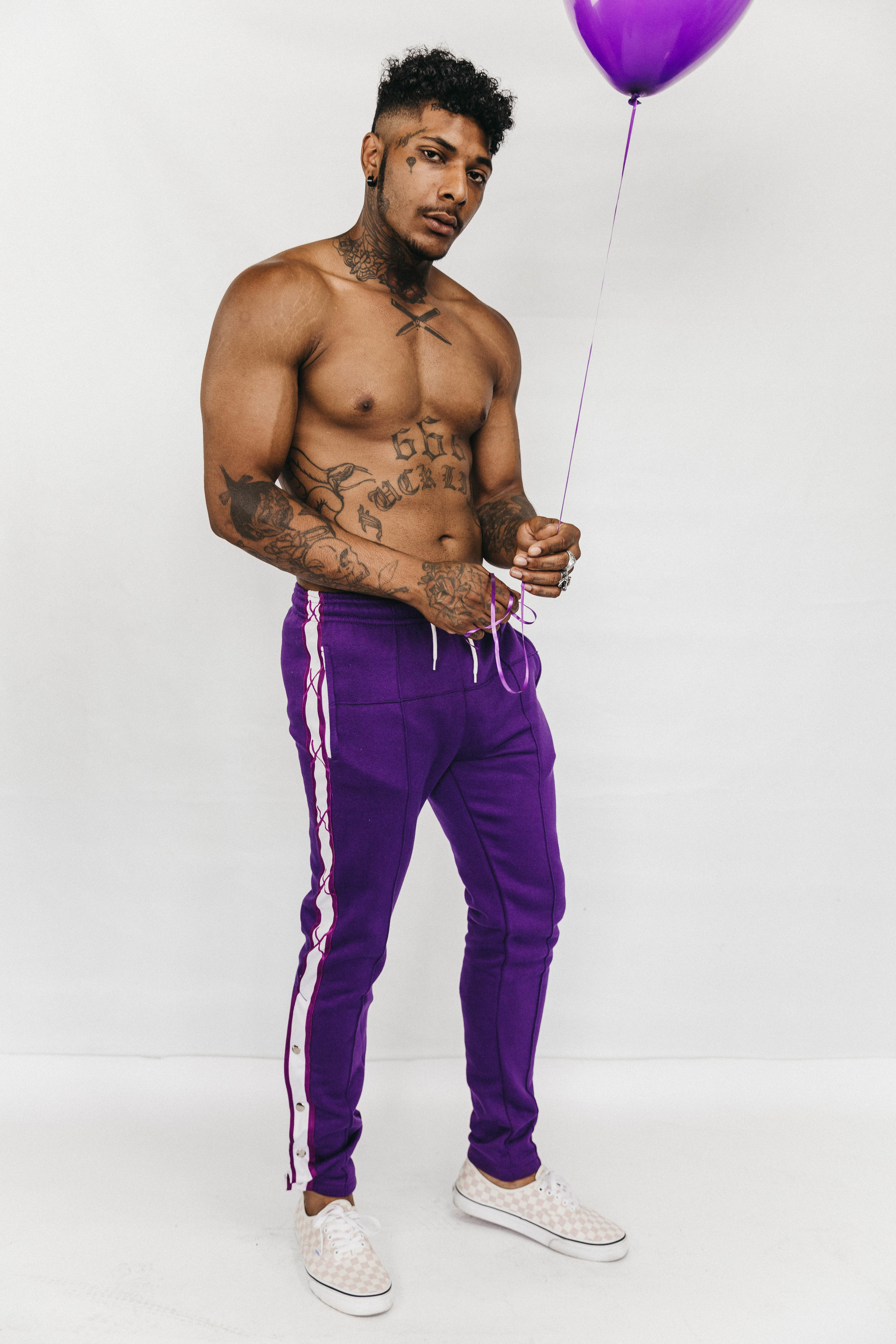 purple track pants