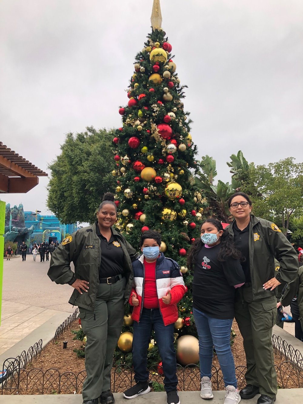 Probation Officers pose with their student partners at SeaWorld.