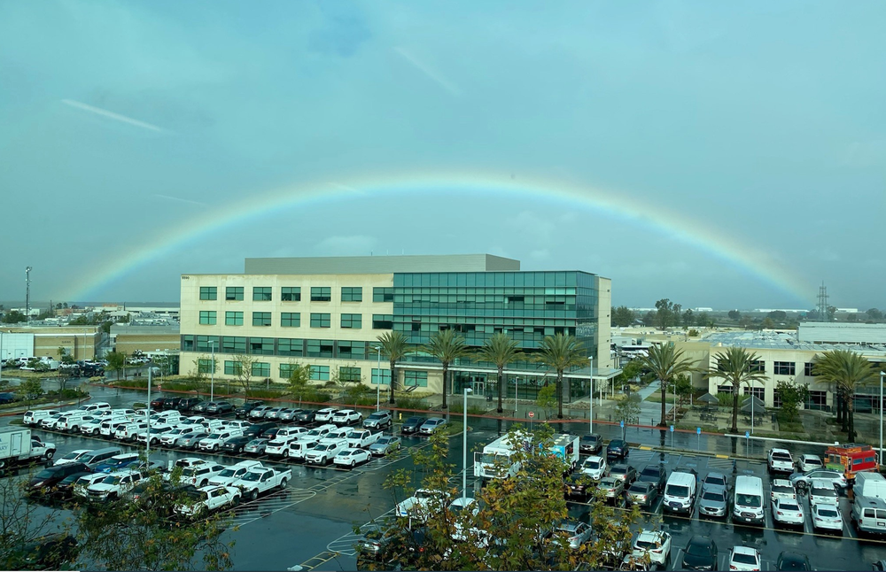 rainbow over an office building+