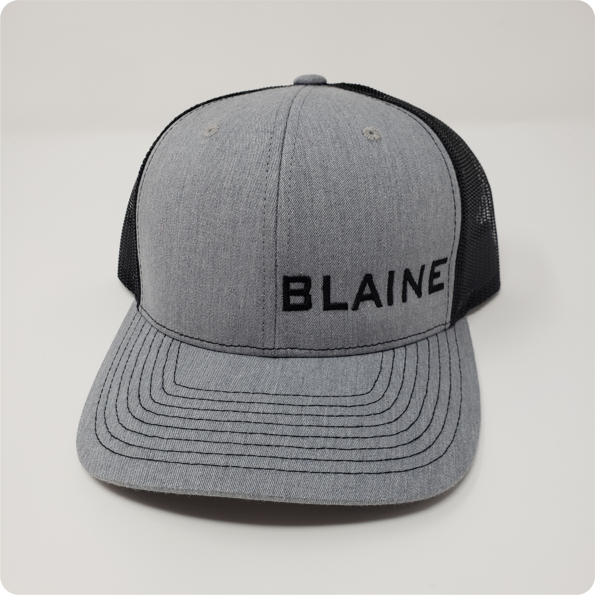 grey black trucker hat
