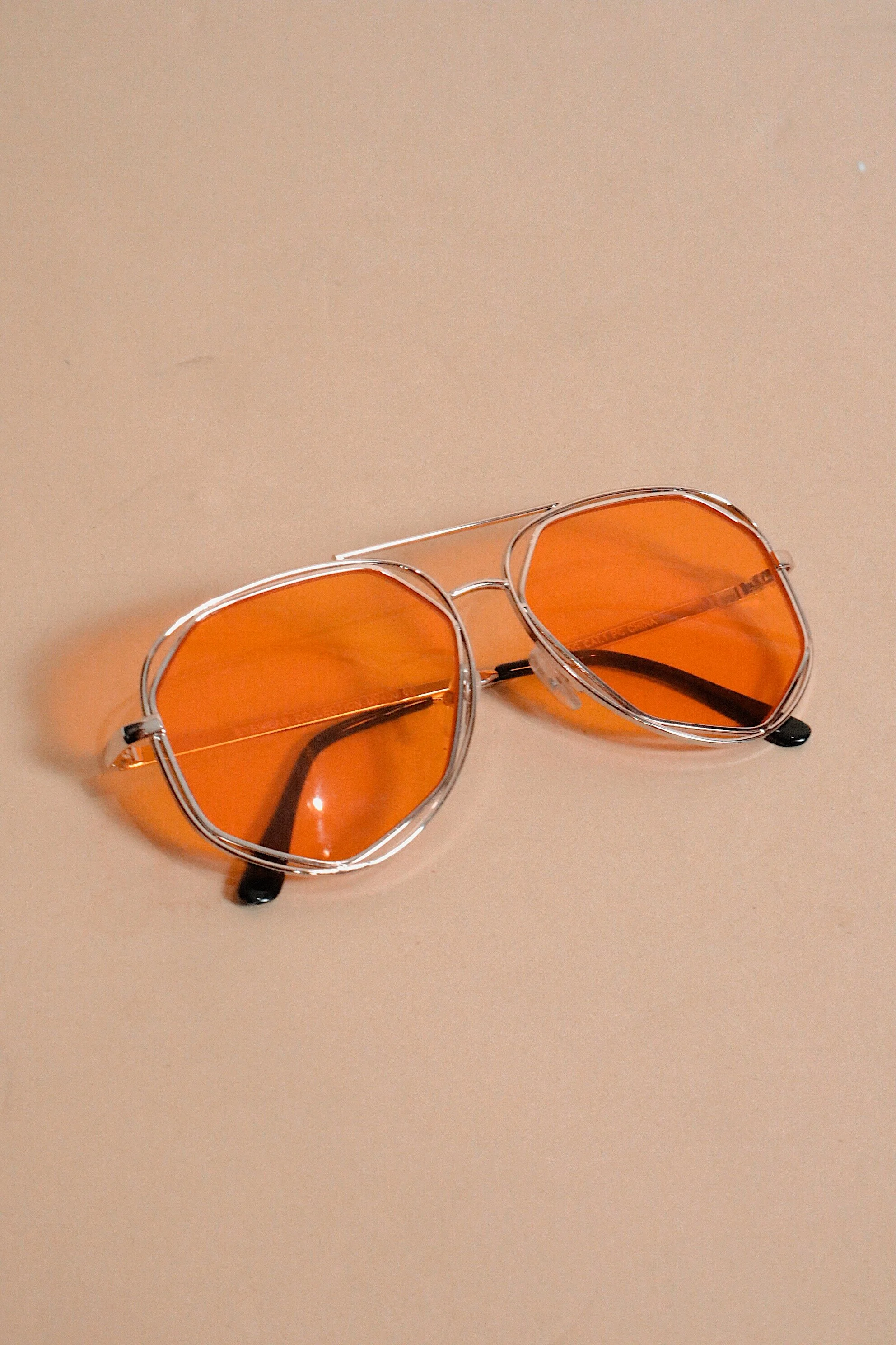 one eye glasses on chain