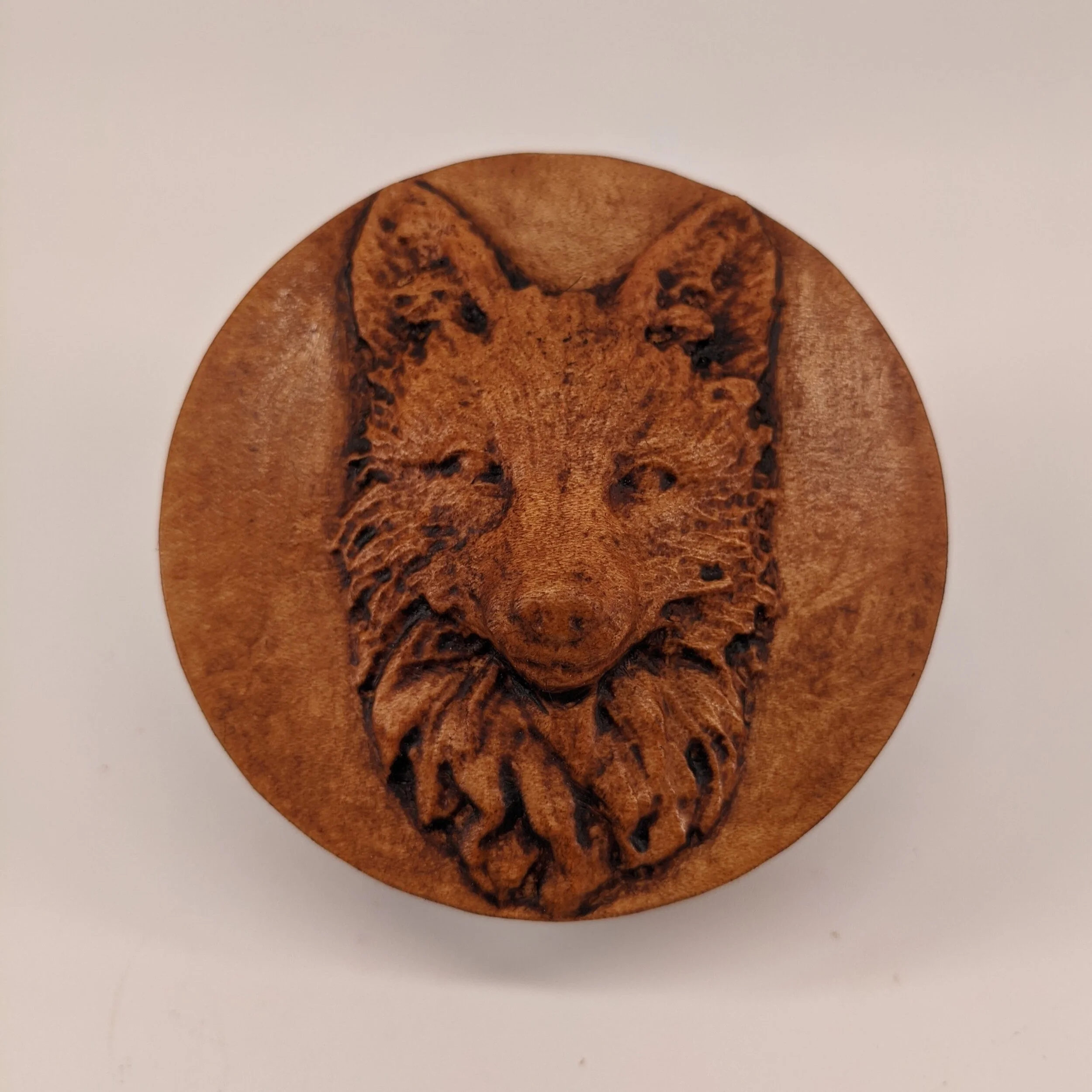 carved wooden fox