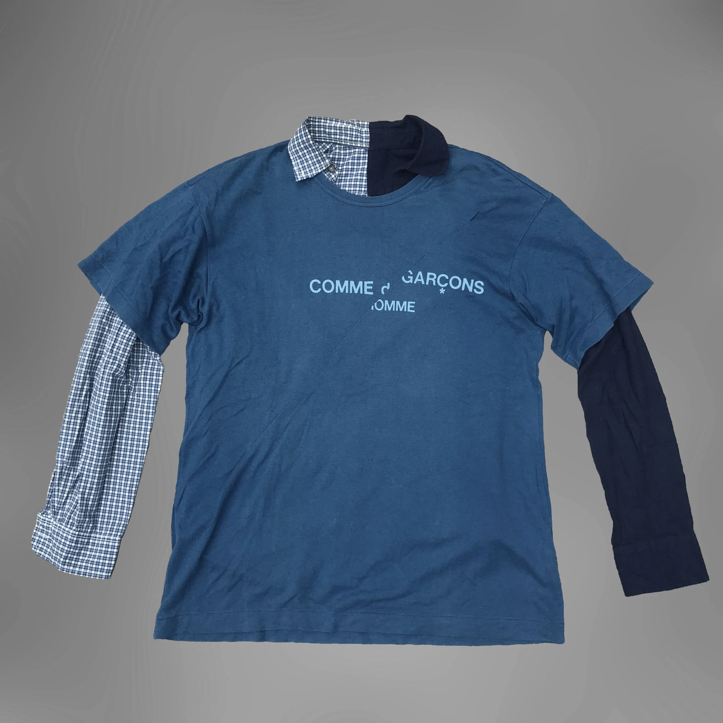 comme des garcons split logo