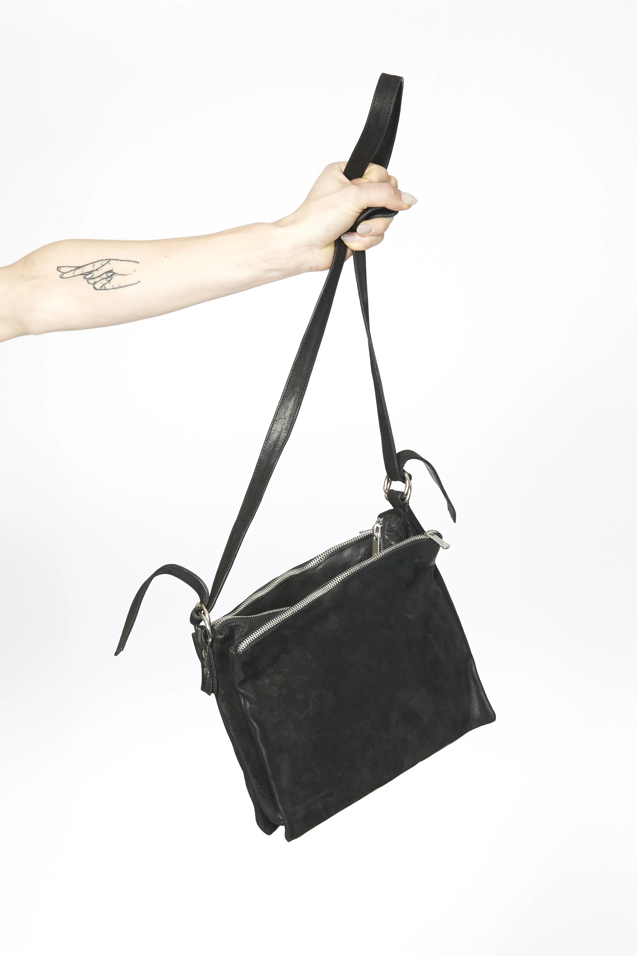 crossbody bag with side pockets