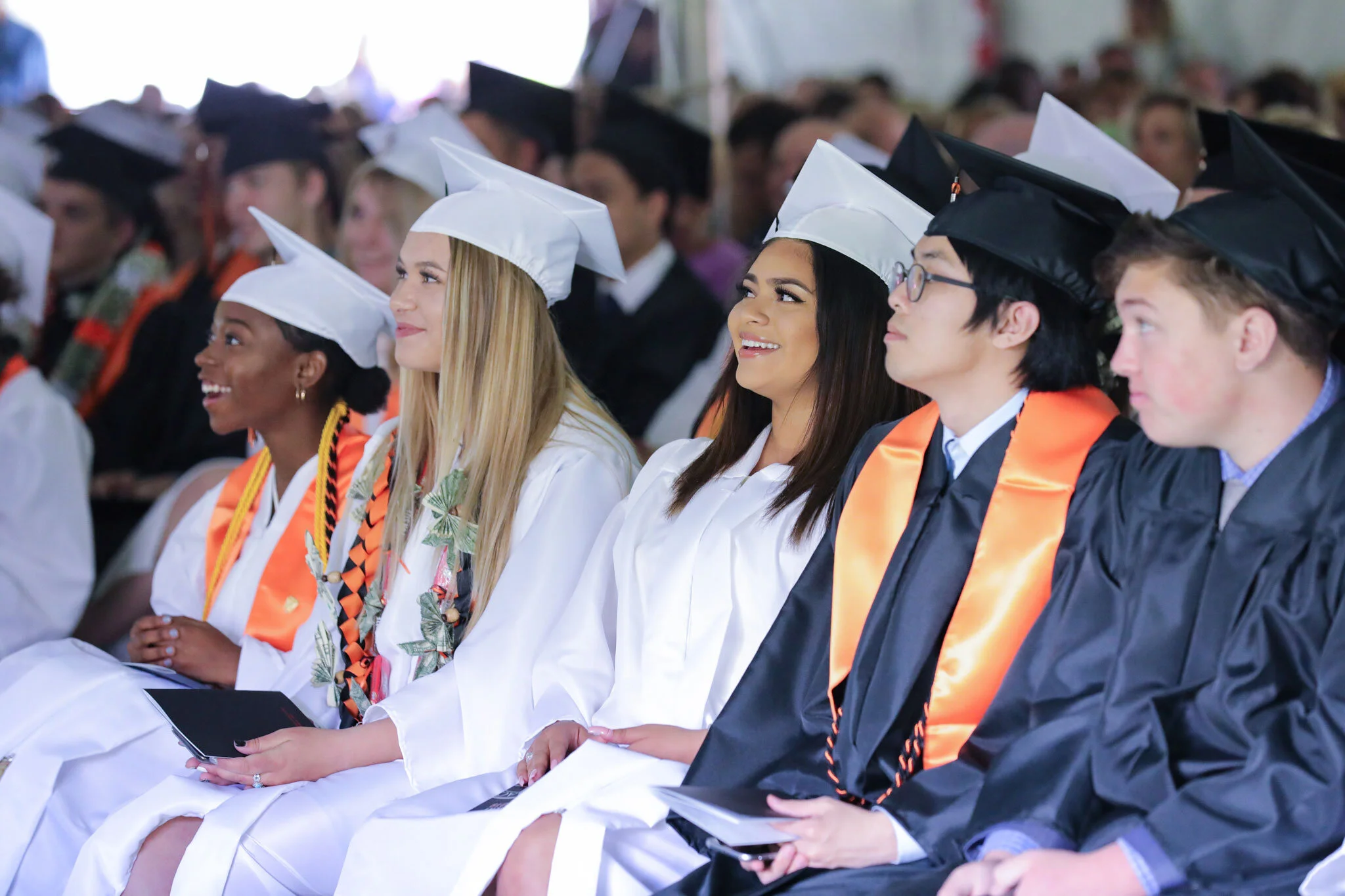GraduatesWatchingSpeaker.jpg