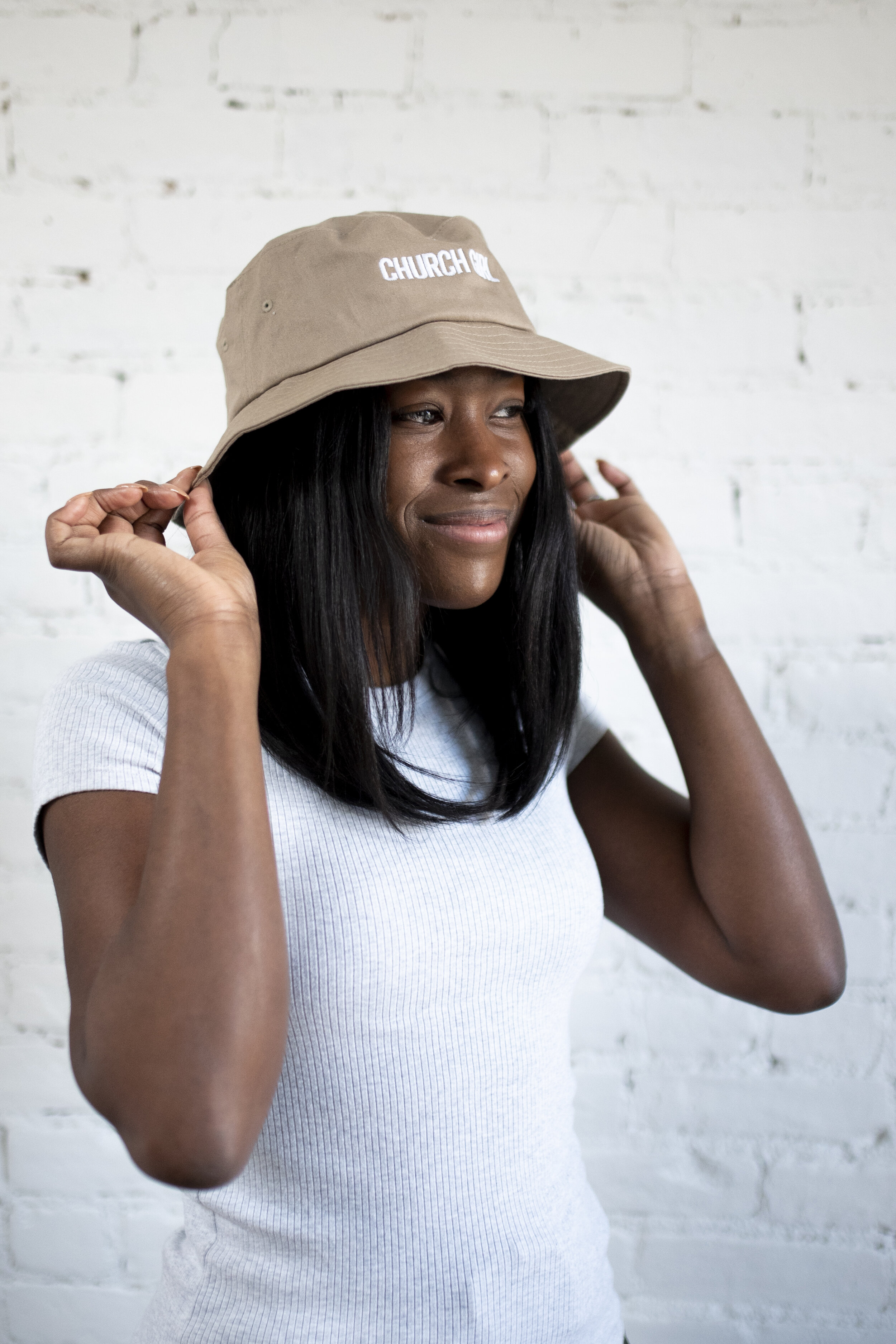 girl with bucket hat