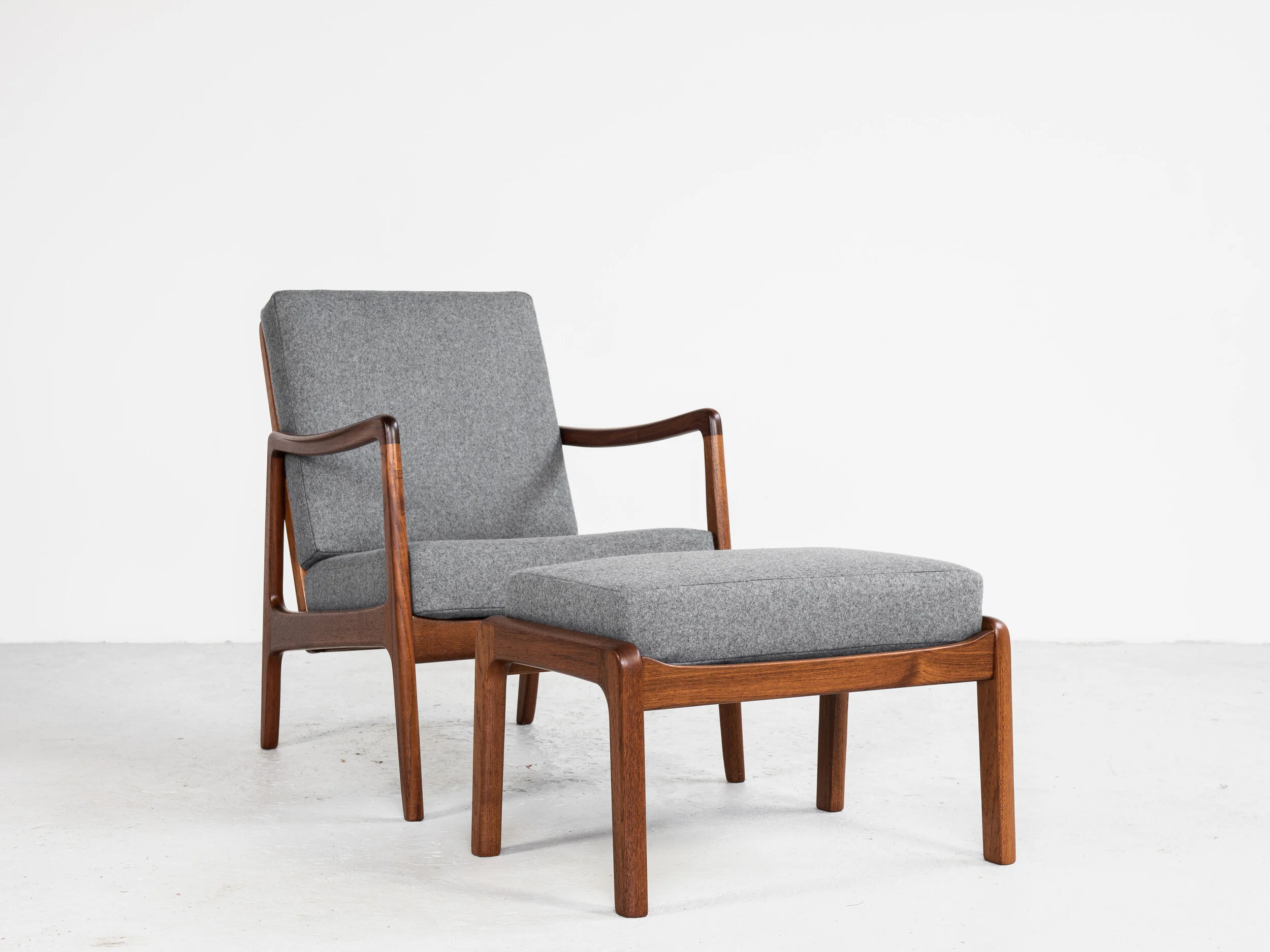 Midcentury Danish easy chair and ottoman in teak by Ole Wanscher
