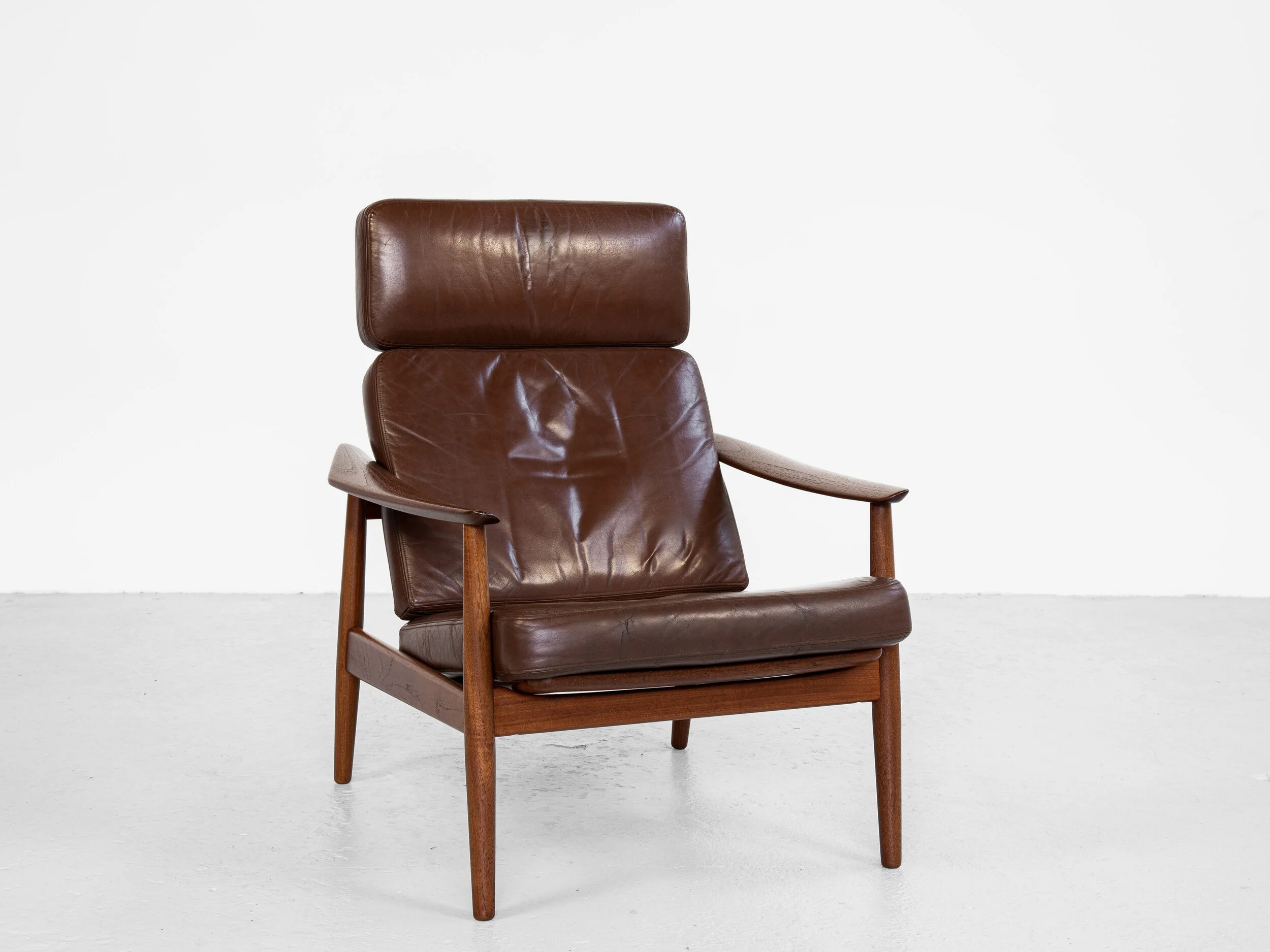 Teak and leather lounge chair sale