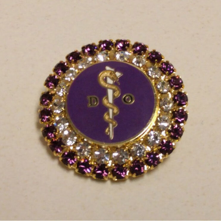 purple brooch