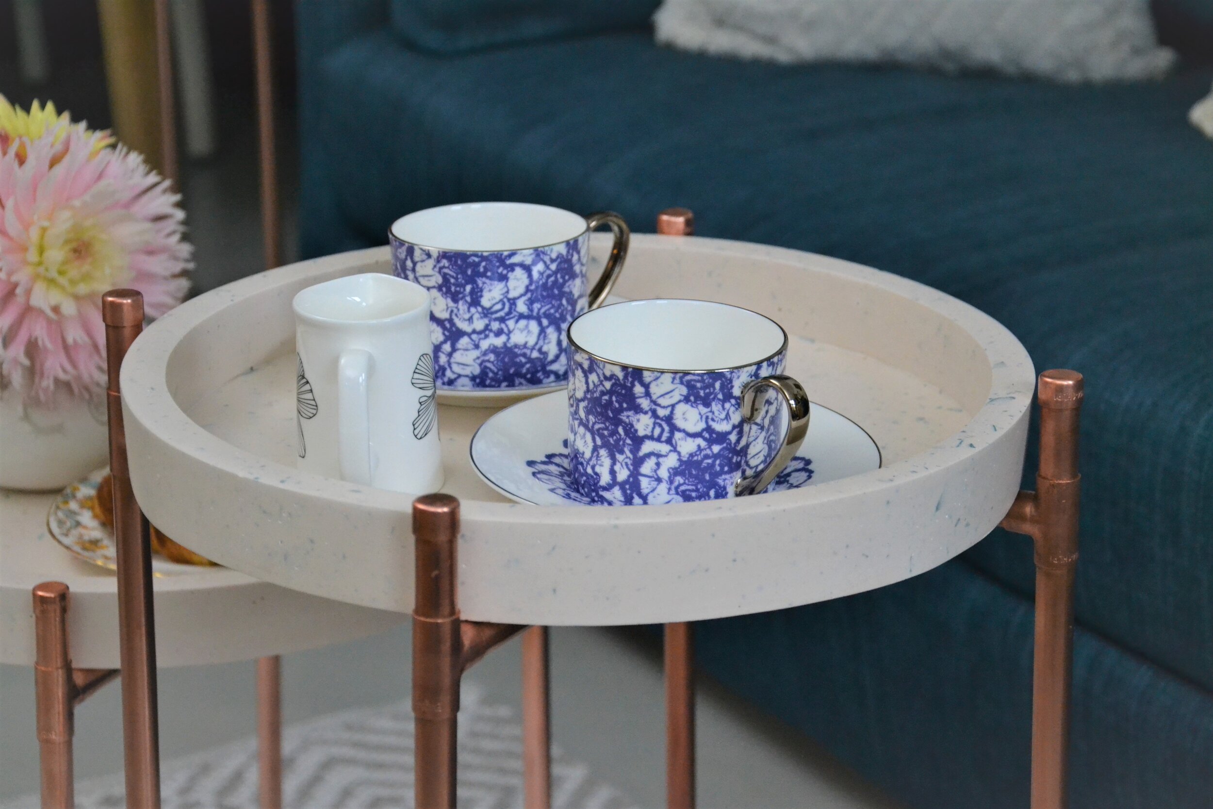 Round coffee table with tray A Softer Edge