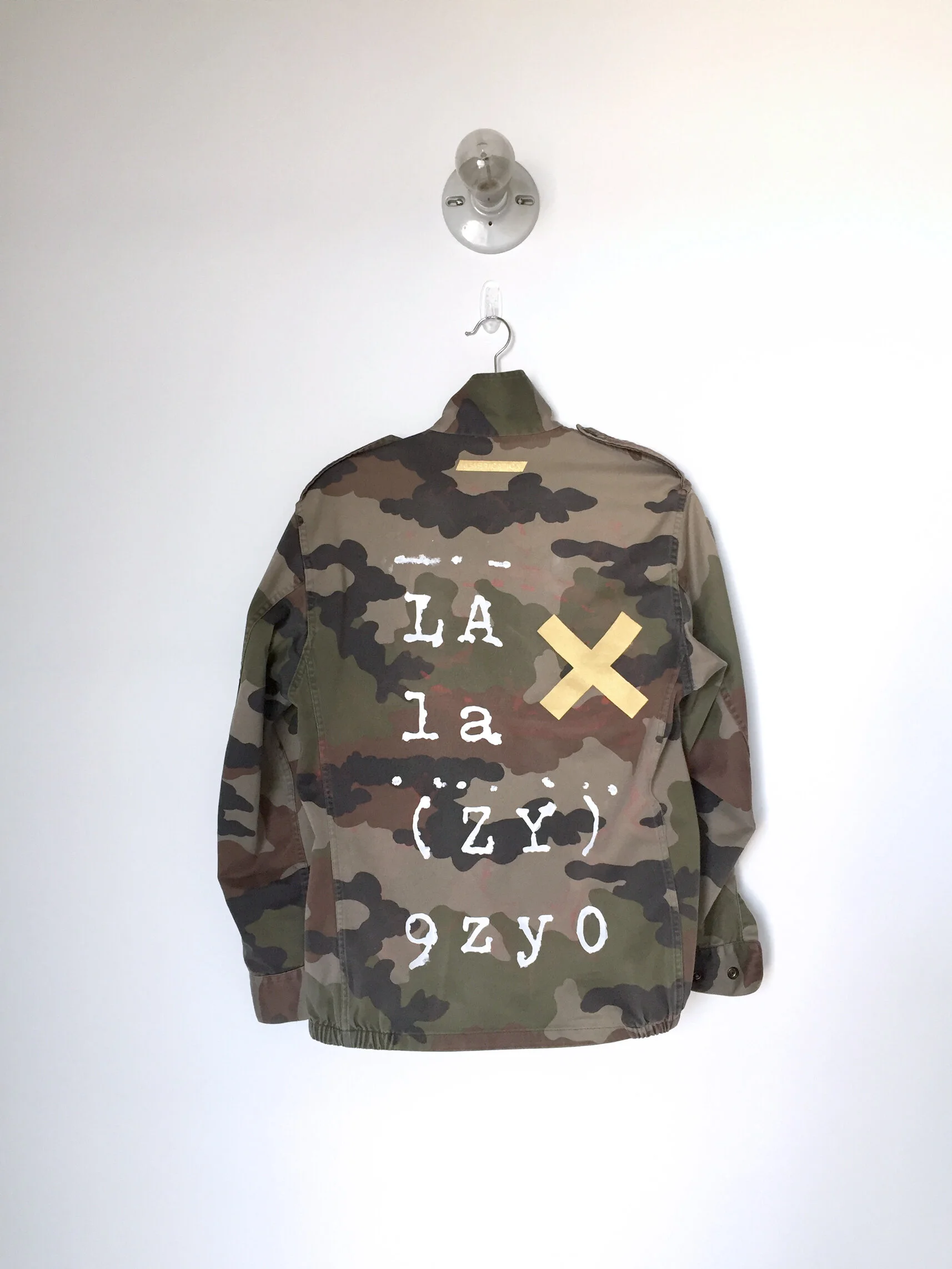 camo jacket with writing on back