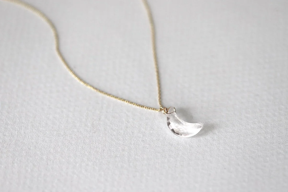 Small crescent shop moon necklace
