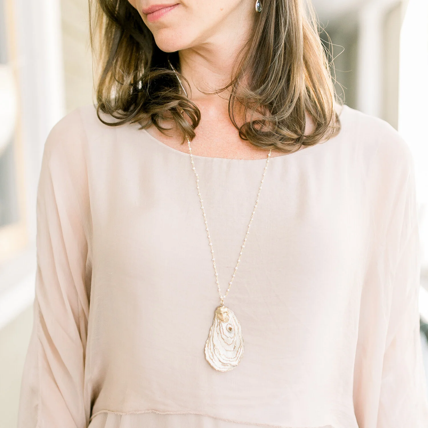 Gold hotsell oyster necklace
