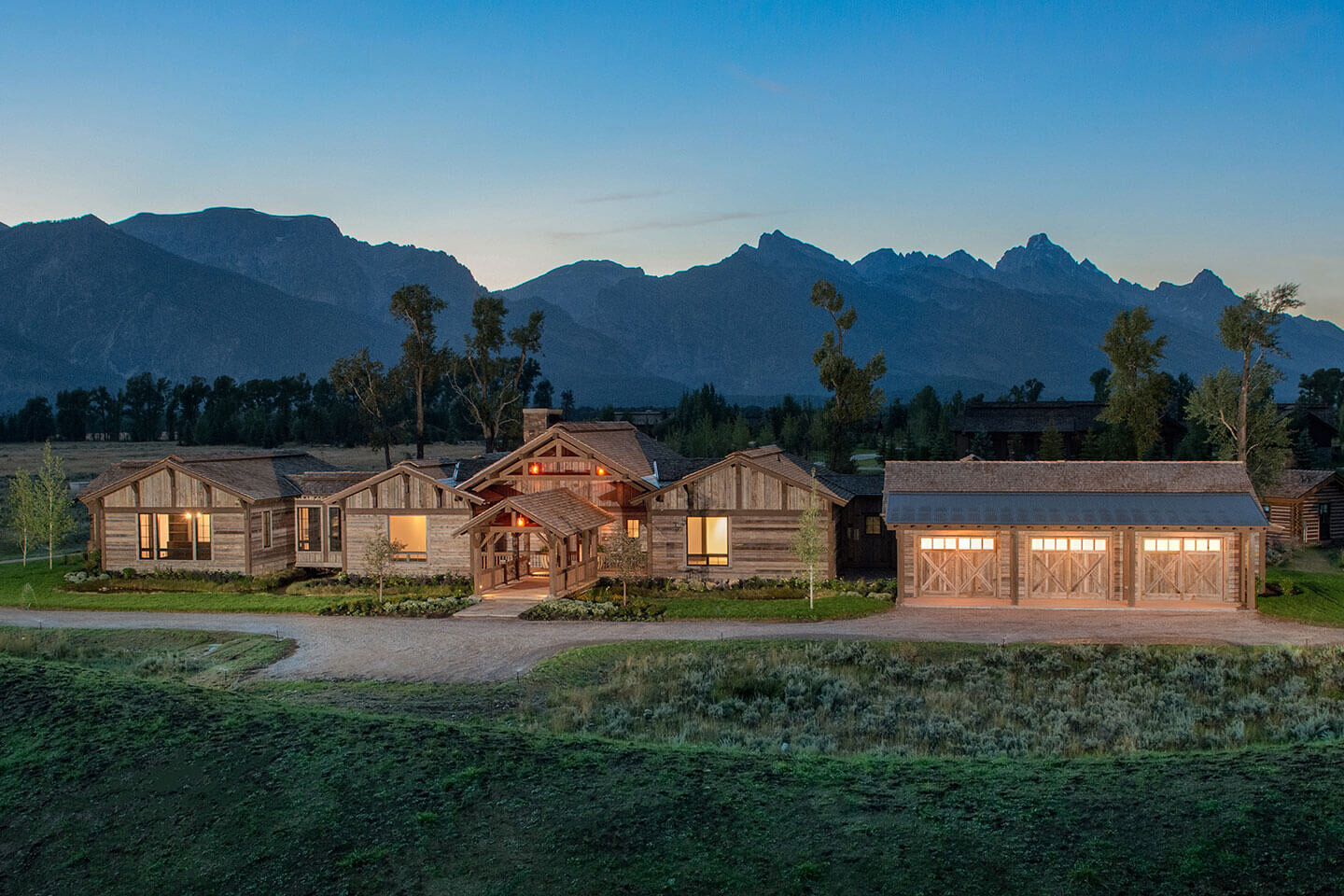 Evening view of residence with Grand Teton in background