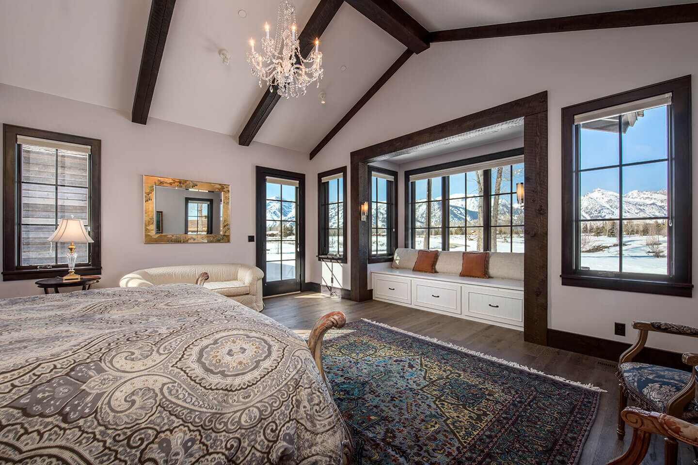 Master bedroom with view and crystal chandelier
