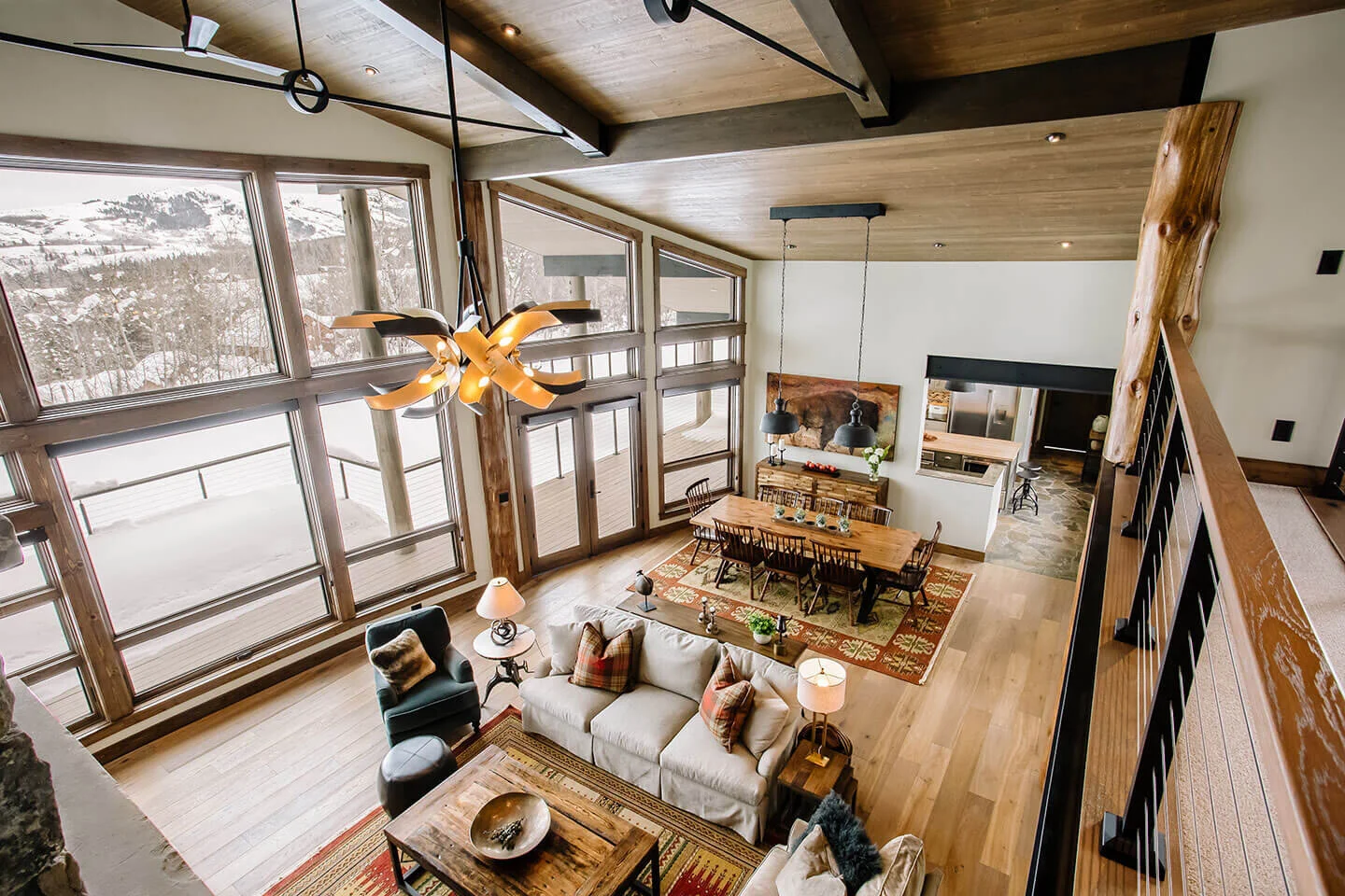 Looking down onto dining room from loft