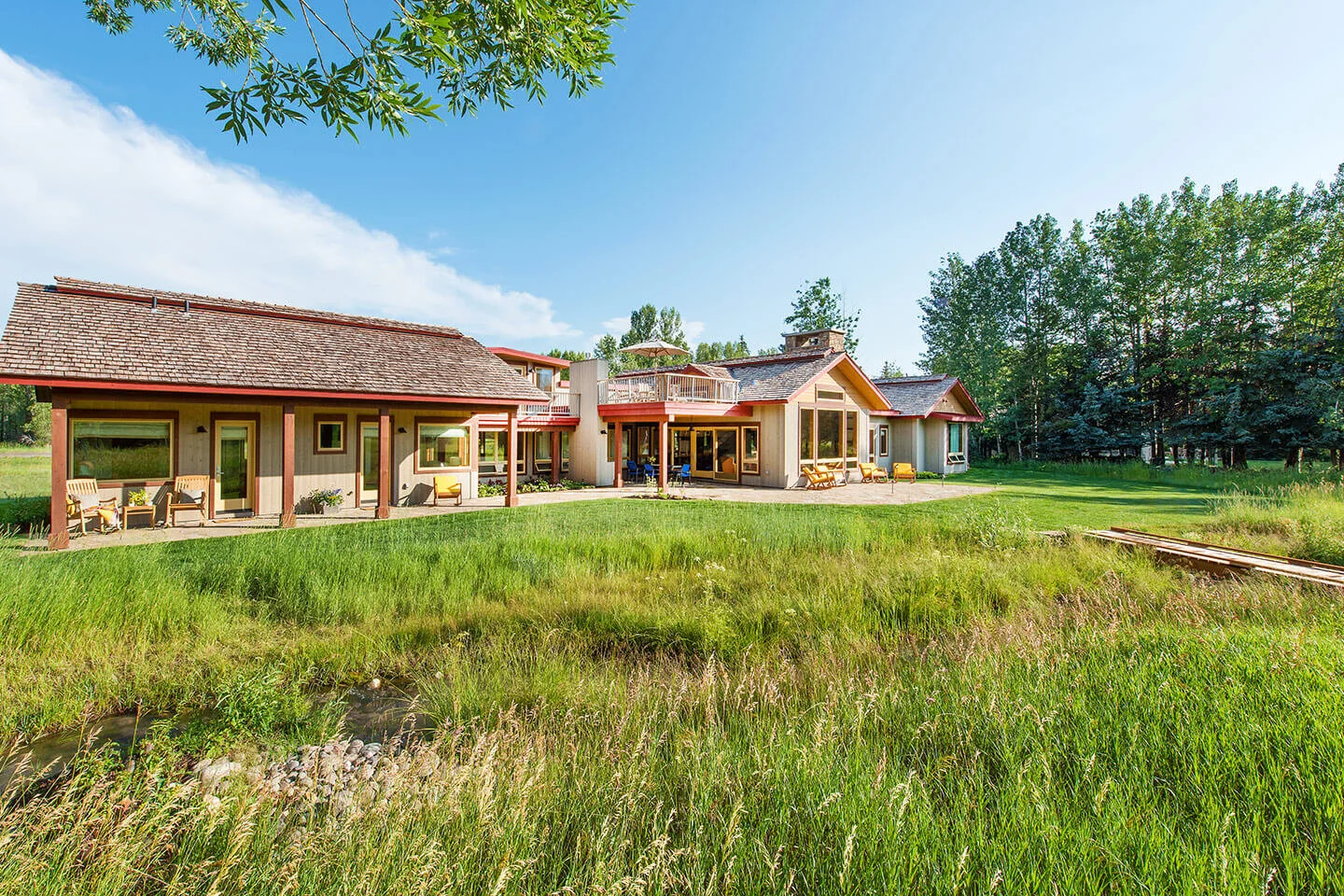 House exterior view from green field