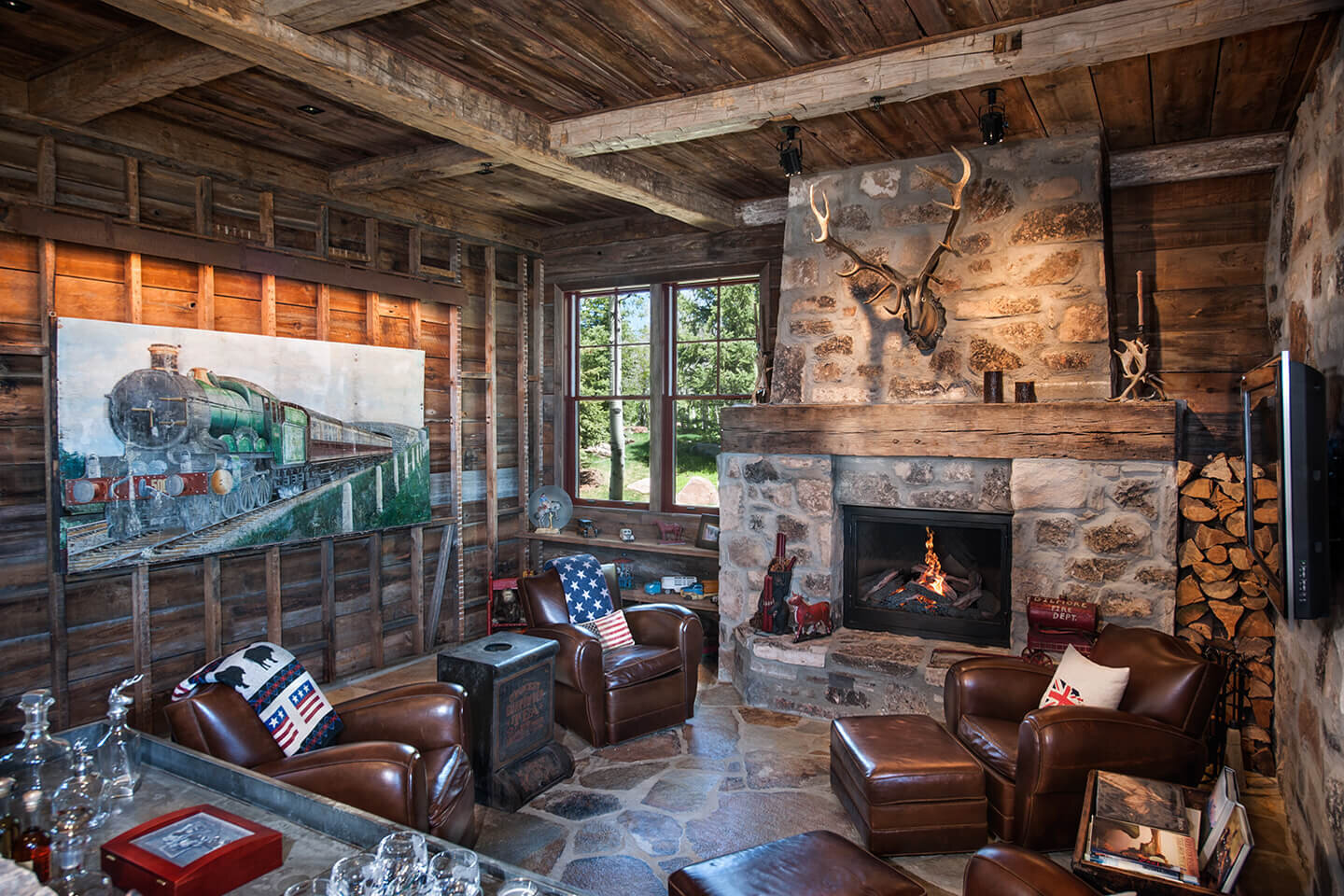 Rustic living room with artwork and fireplace