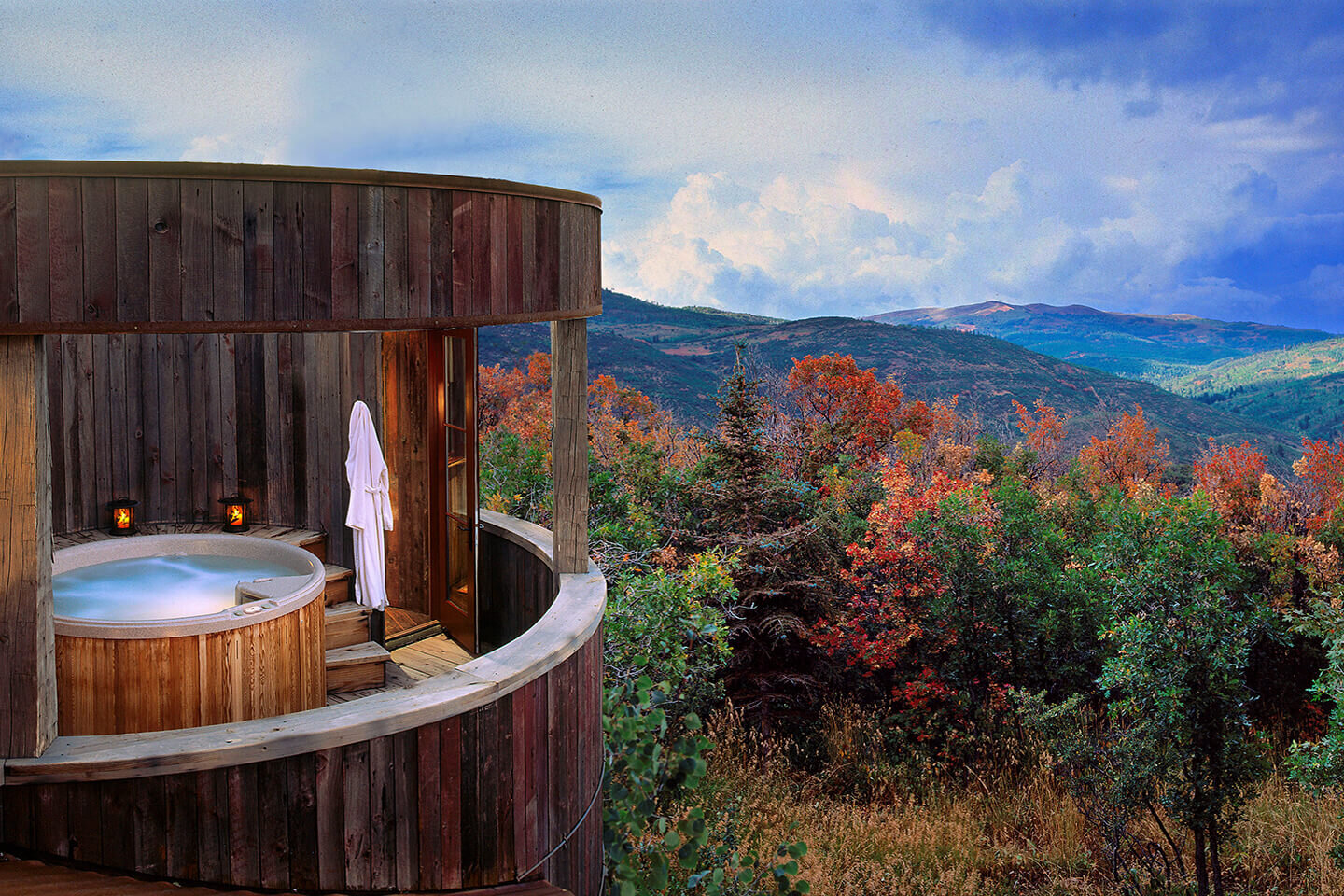 Round jacuzzi with a view toward distant hills