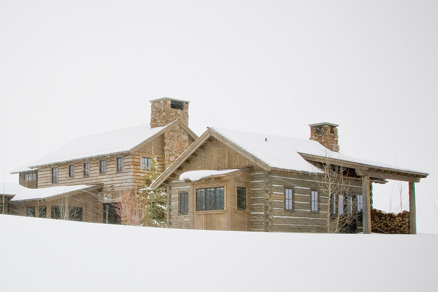 Rustic home exterior view in winter