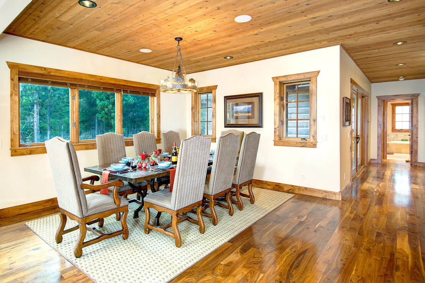 Dining room with wood floor and ceiling