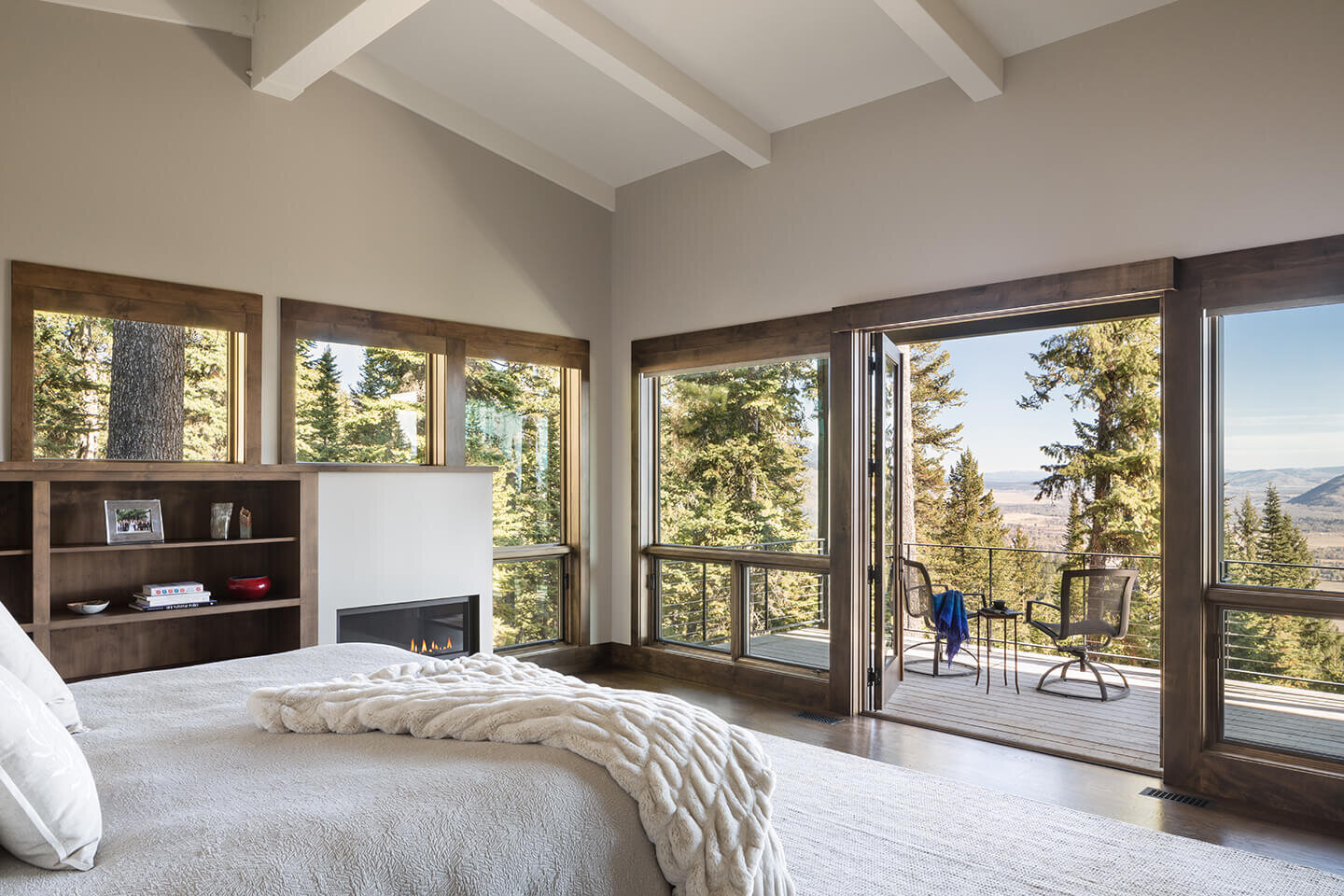 Master bedroom with large windows and view