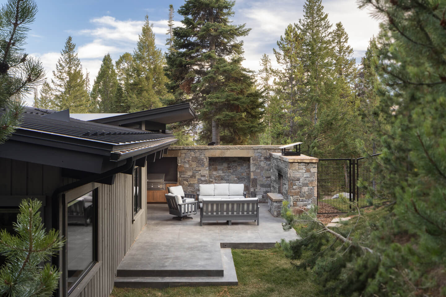 Patio with view of butterfly roof