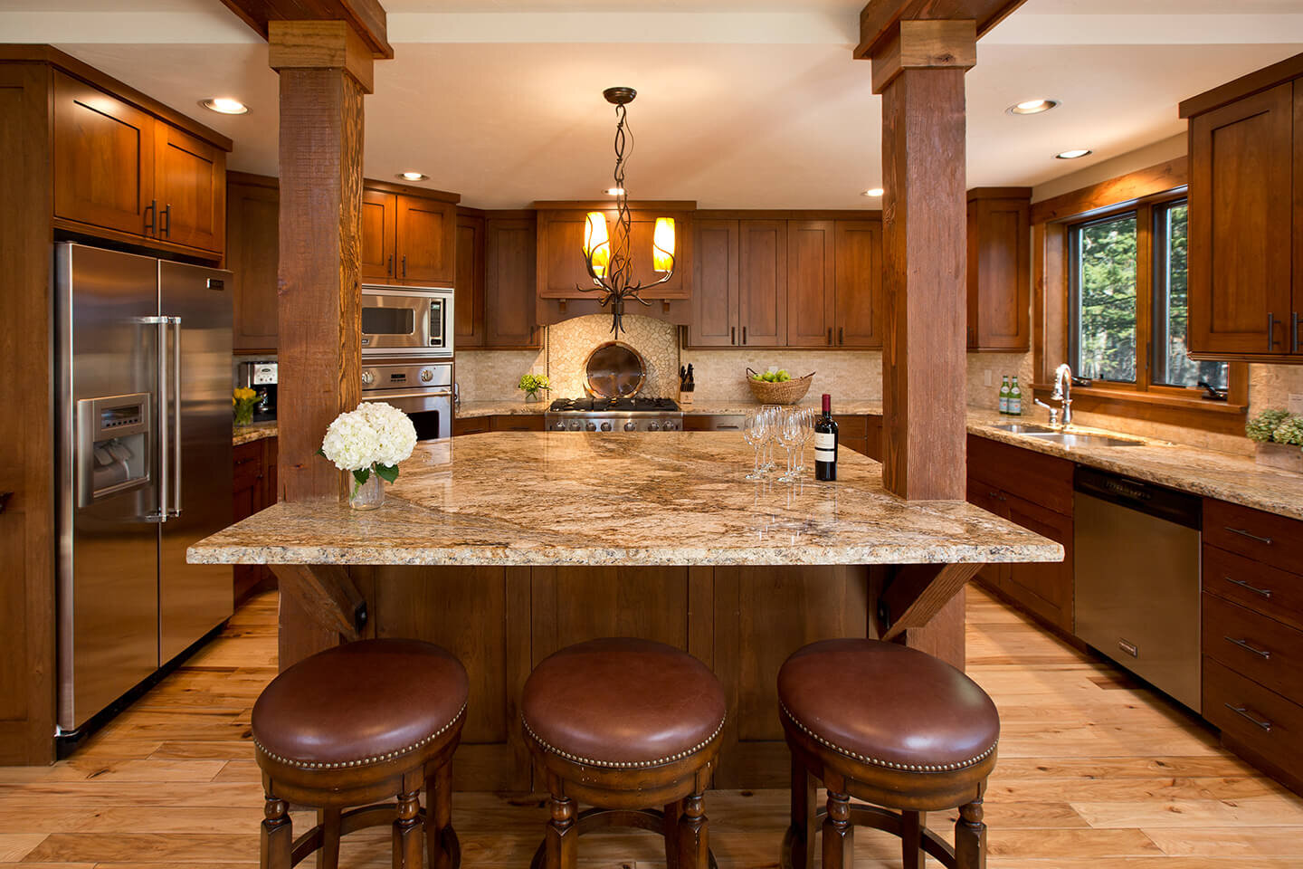 Kitchen with granite counter top and cherry wood cabinetry