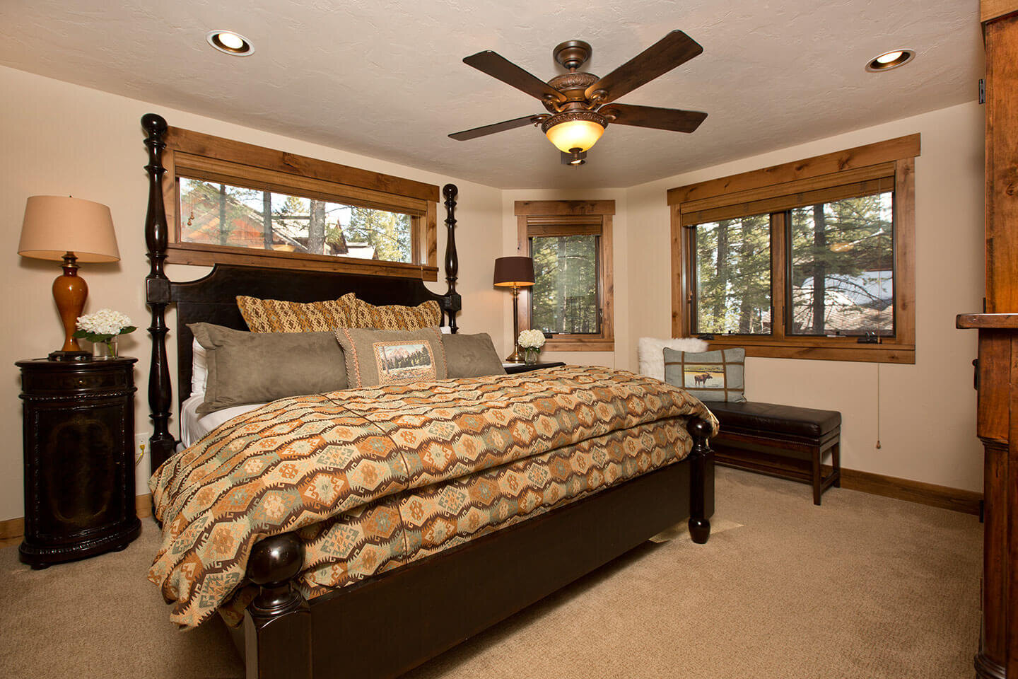 Bedroom with patterned quilt