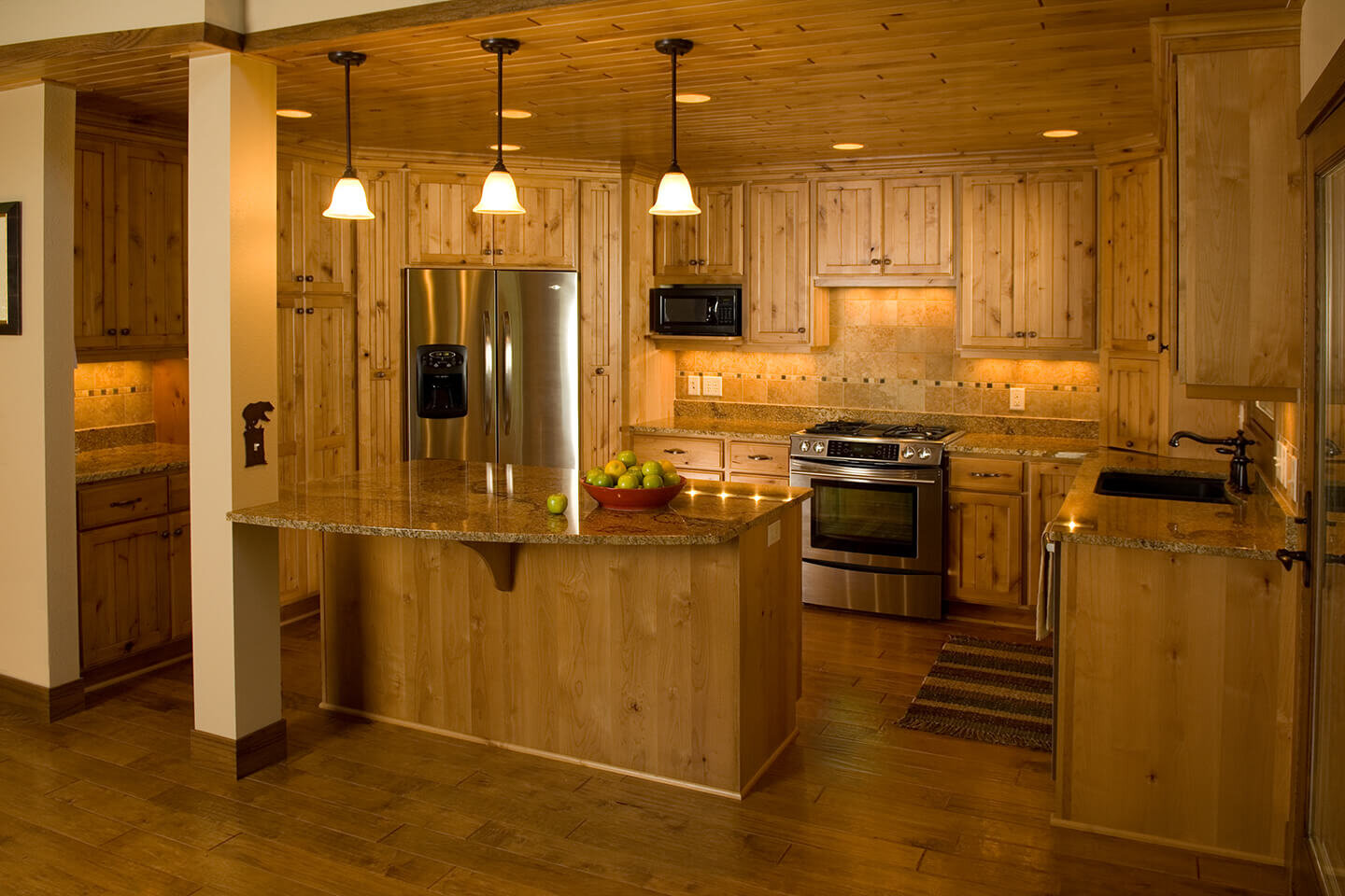 Kitchen with pine wood cabinetry