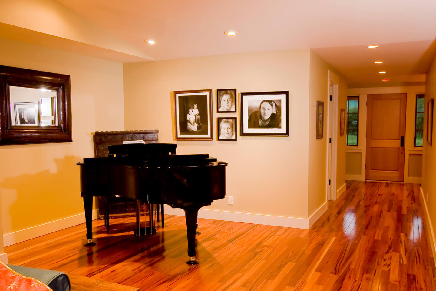 Grand piano on varnished wood floor