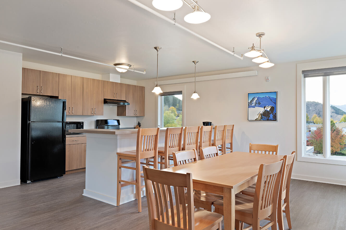Commons kitchen with dining room table and chairs