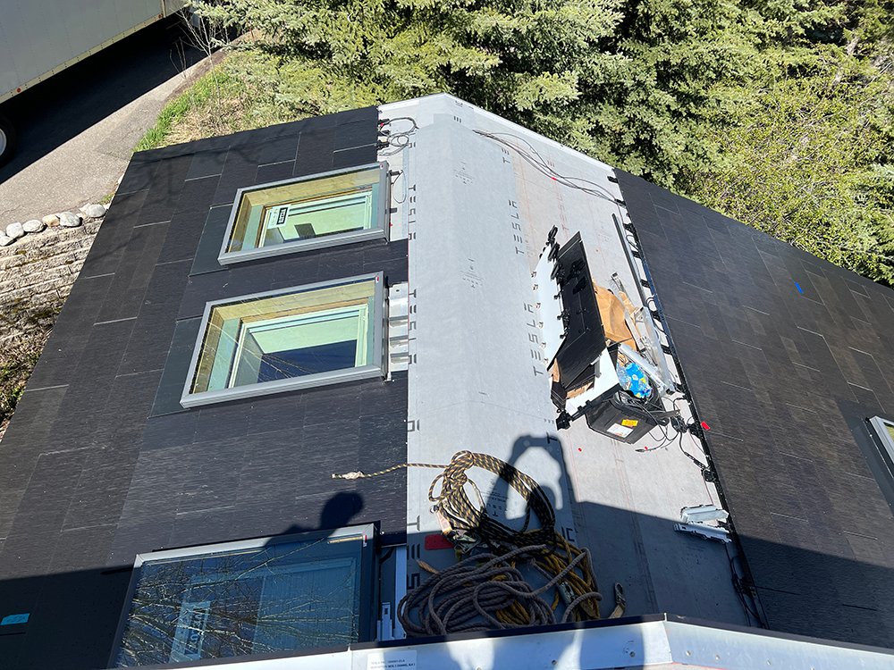Tesla roof installation in progress