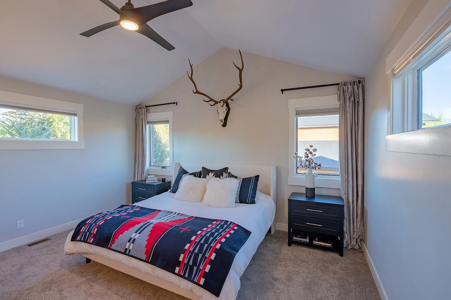 Bedroom with high ceiling and windows for privacy