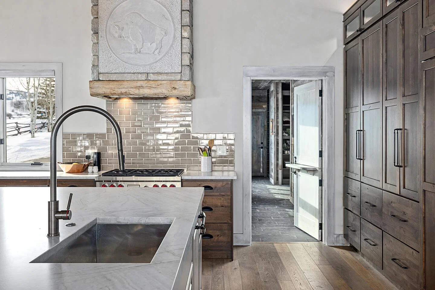 Kitchen with large marble counter top