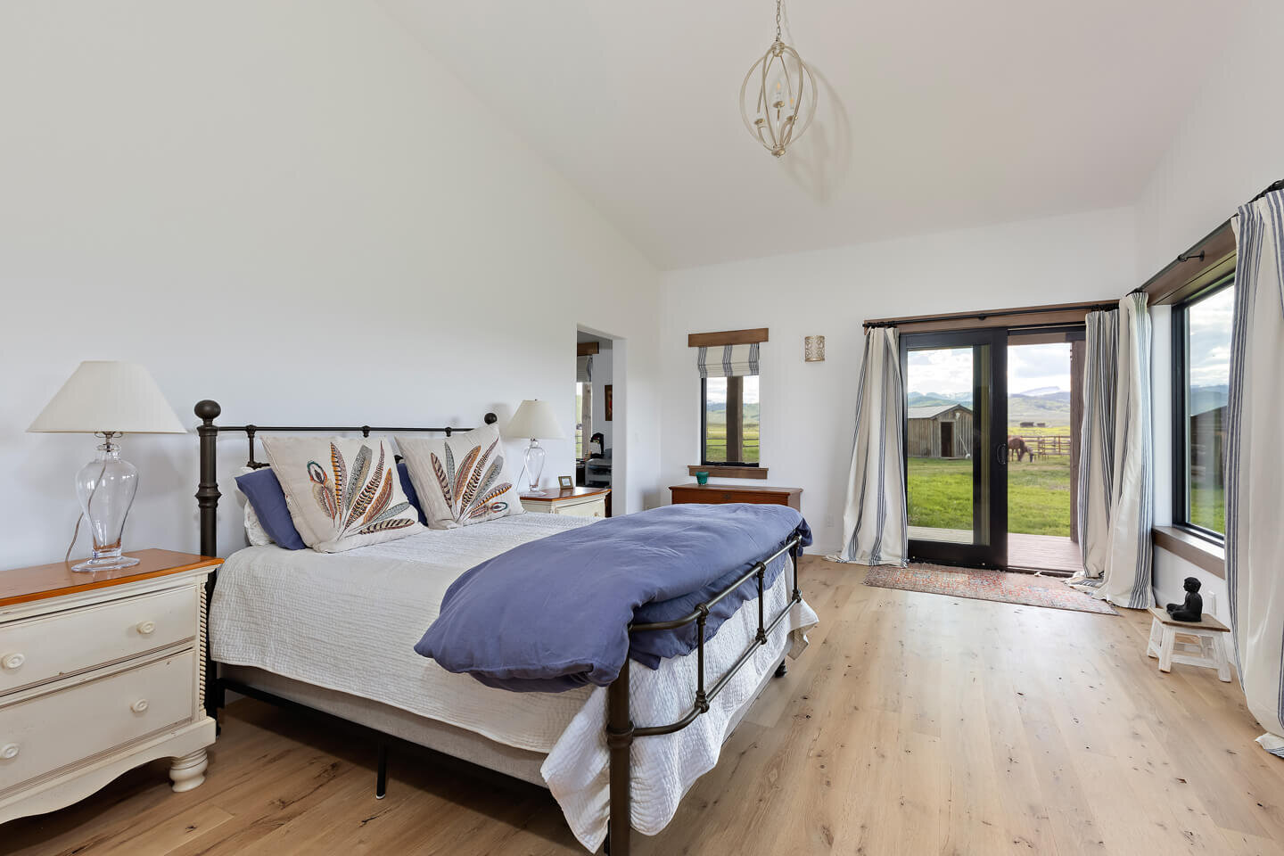 Master bedroom with view to horse corral