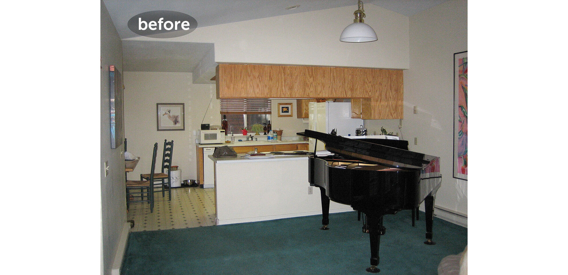 Before remodeling kitchen view with piano 
