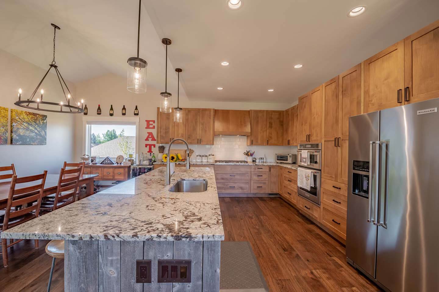 Kitchen with lighting and large counter