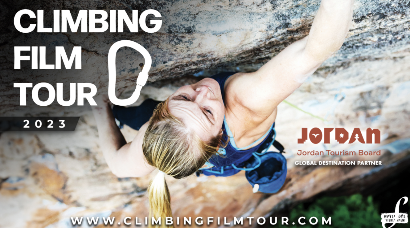 Girl climbing rock face