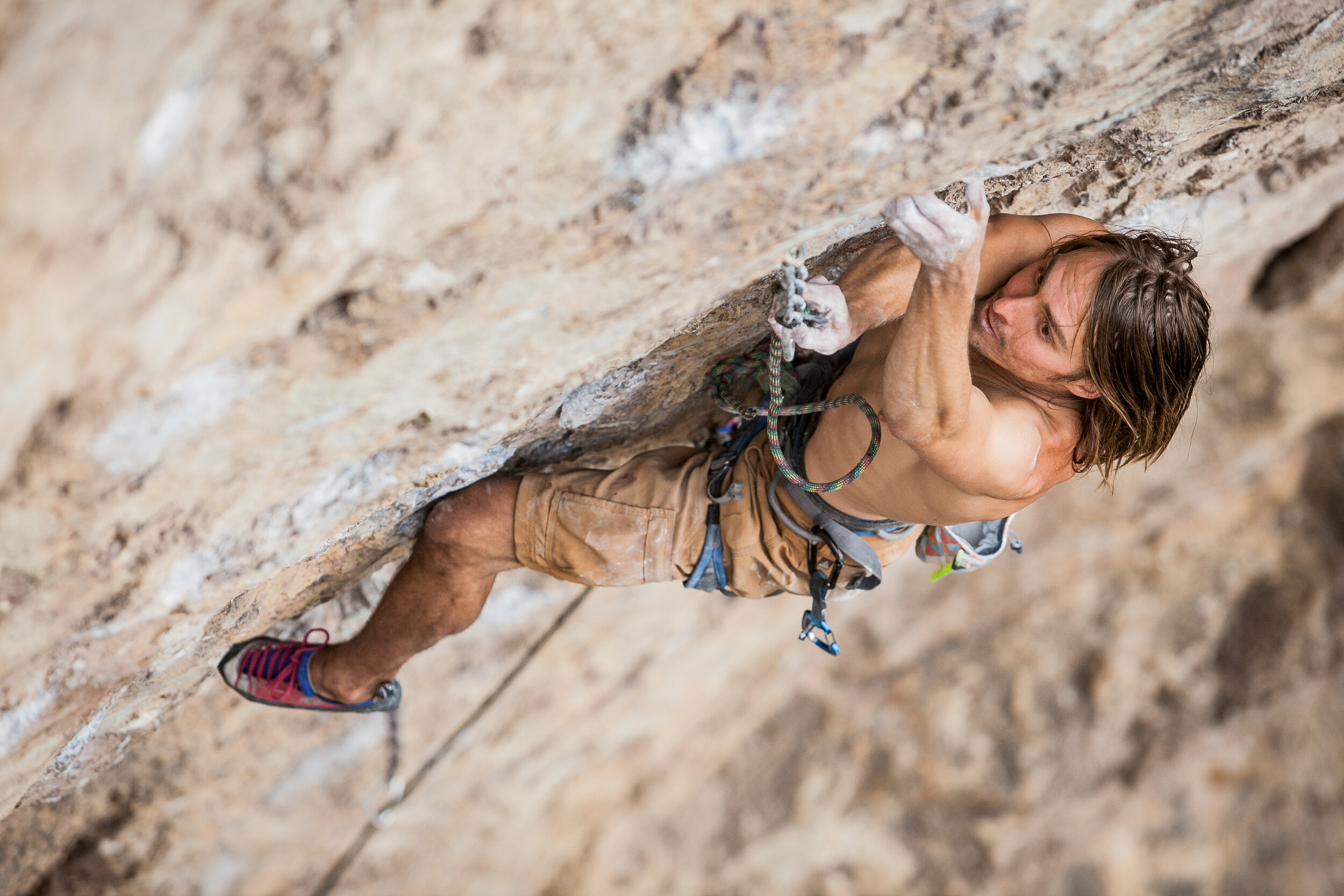 Male rock climbing