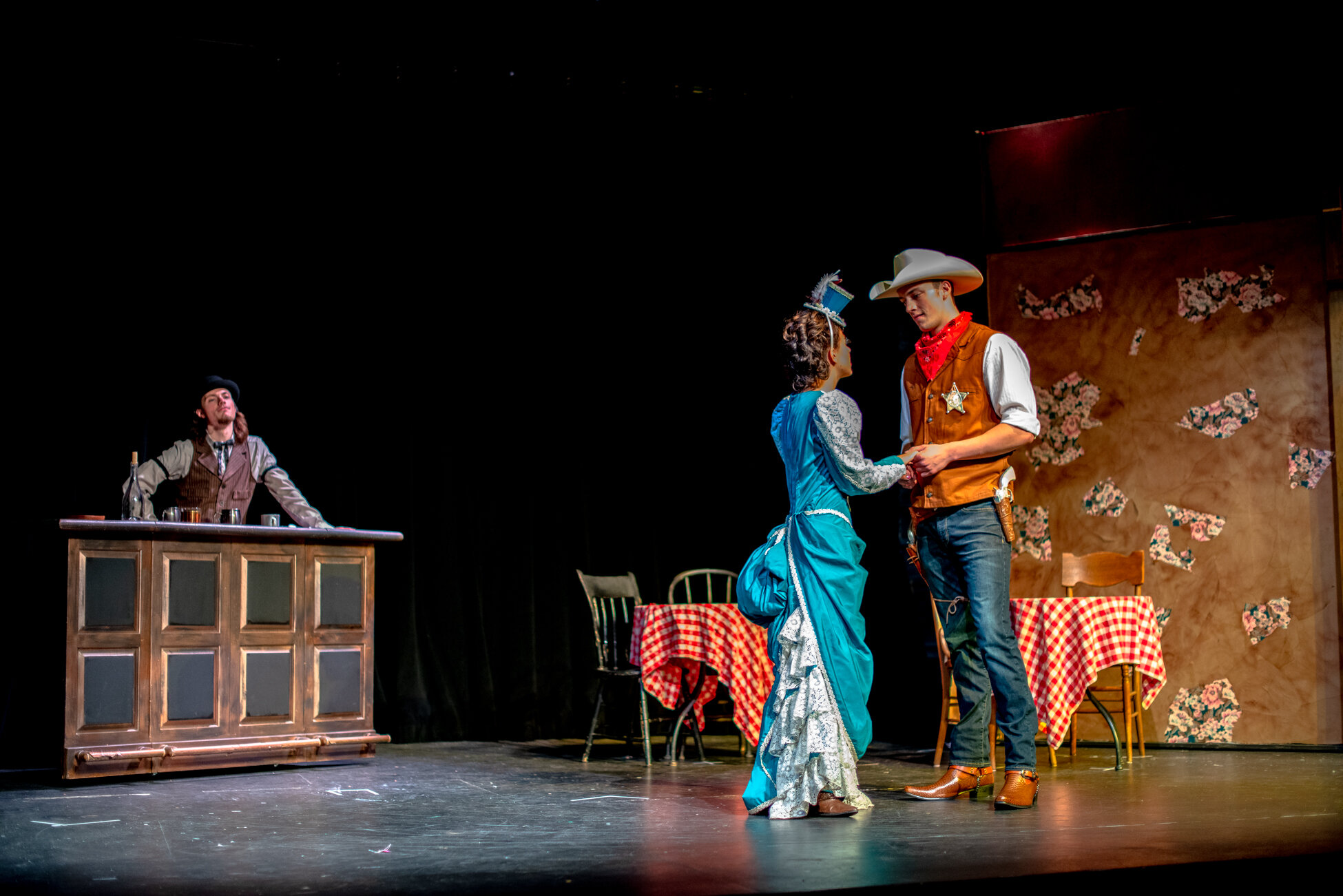 Play with a cowboy and lady on stage