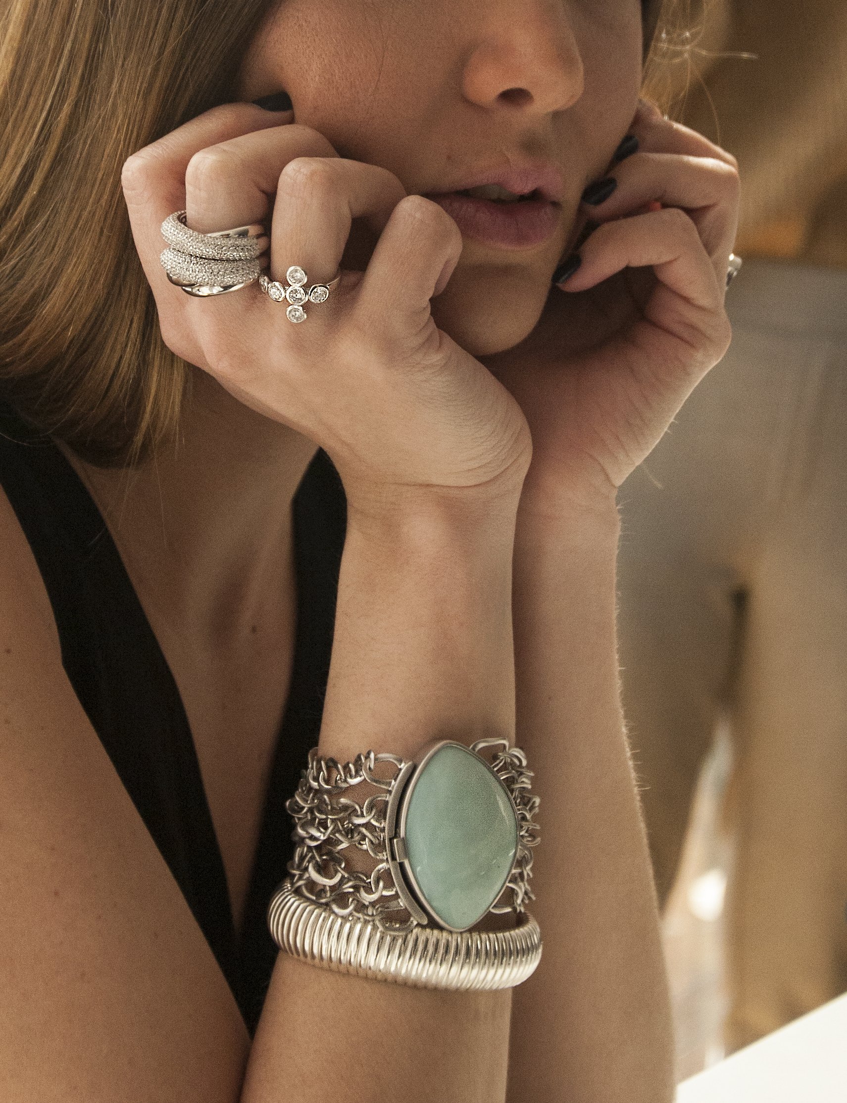 Woman posing wearing Cora Belle & Company Jewelry