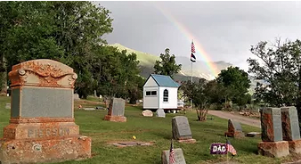 Cedar Hill Cemetery with Rainbow in Back Ground