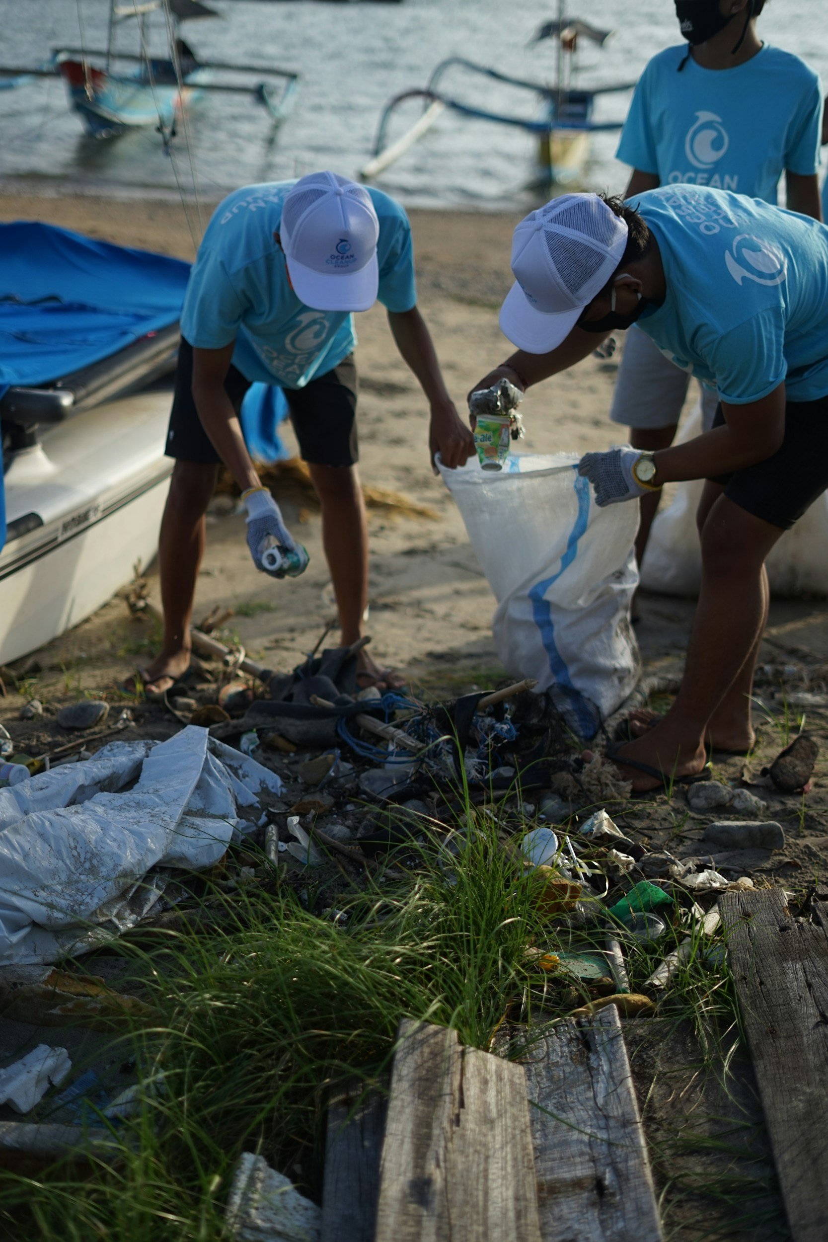 people cleaning up trash