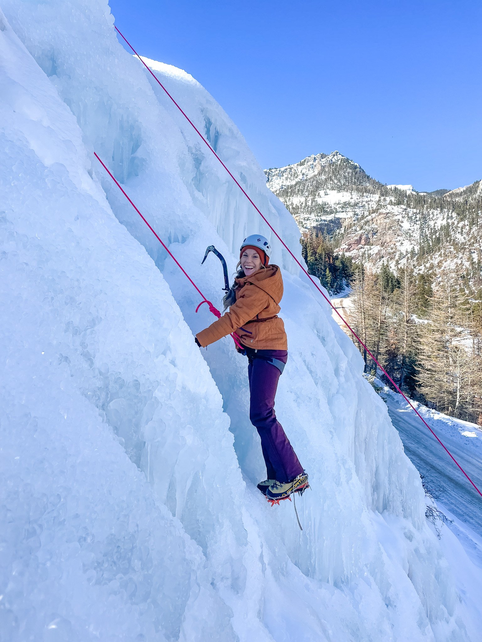 Girl Ice Climbing