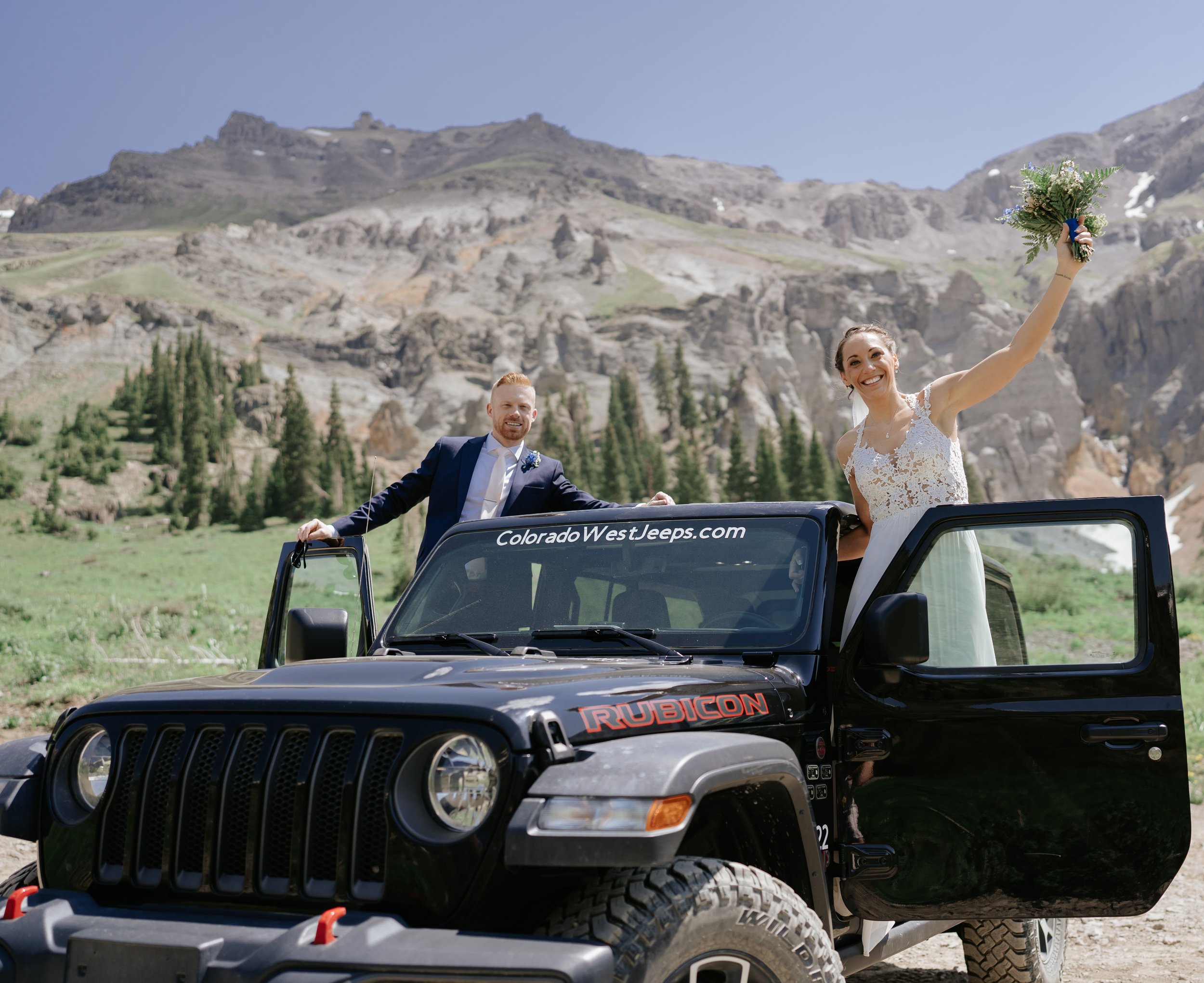 People getting married in a jeep