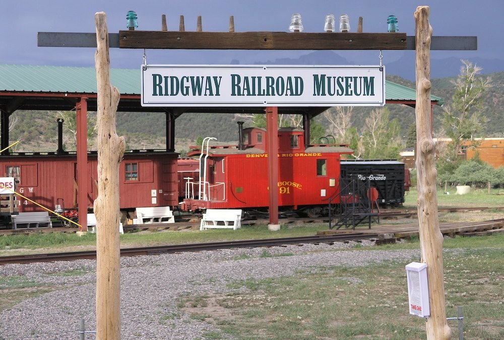 Red railroad car and sign for museum