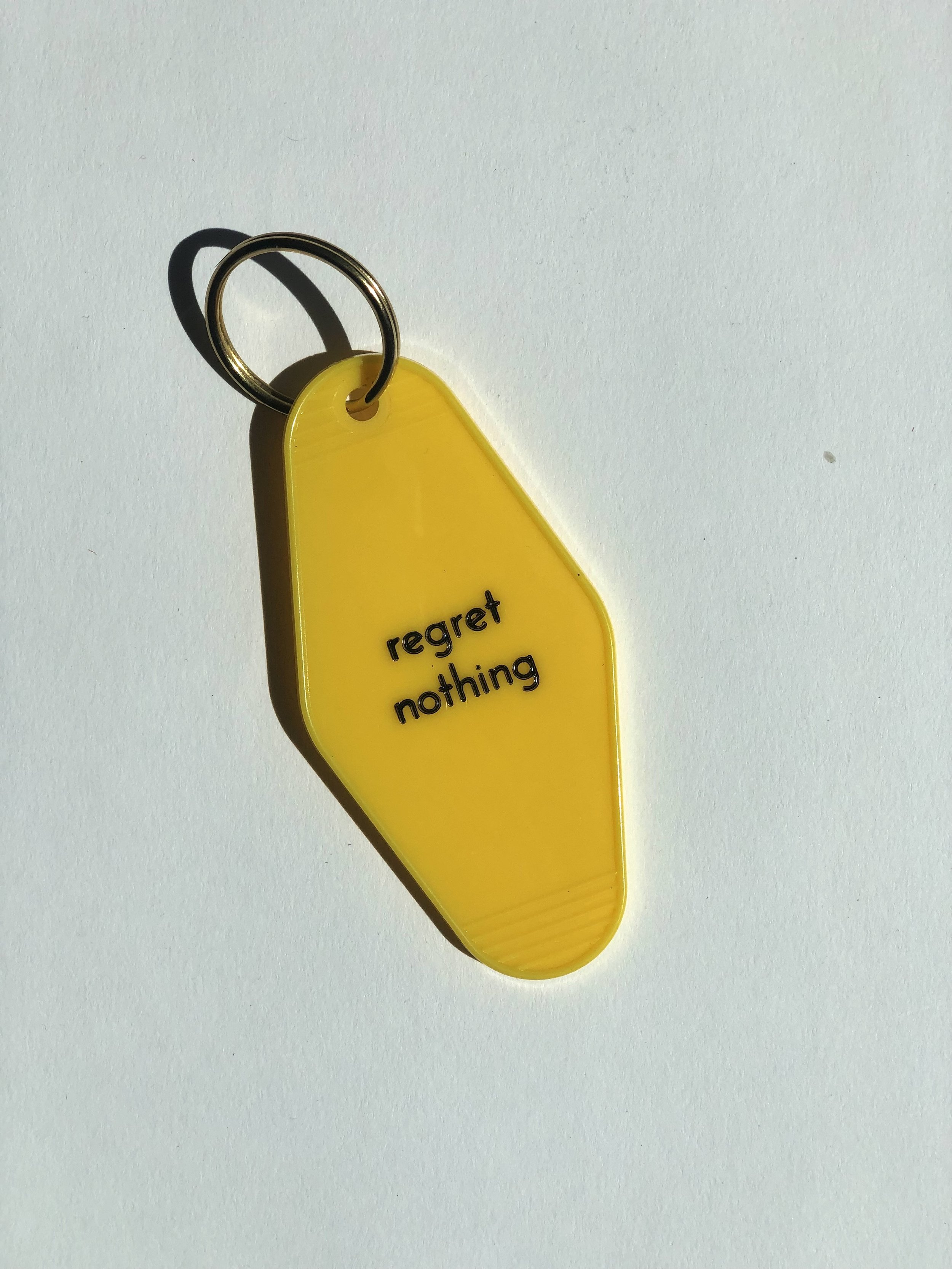 A double sided keychain with a middle plastic clip. This one is probably 20  years old. : r/wherecanibuythis